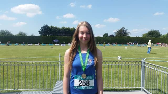 Esther Lear was competing in the Junior Discus competition. inbm25-16s