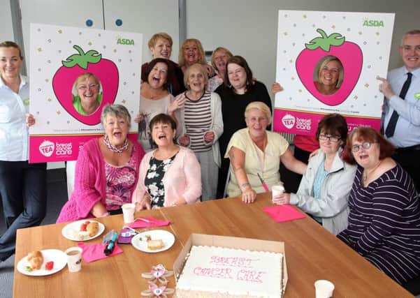 Asda Coleraine representatives and ladies enjoying the fun at the Asda Strawberry Tea event held at the Vineyard in aid of Breast Cancer Care Awareness on Wednesday. INCR24-302PL