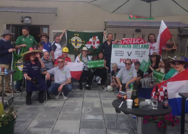 Football fans from multiple nationalities enjoying Sunday's barbecue at Bannview before kick-off in the Northern Ireland game with Poland.