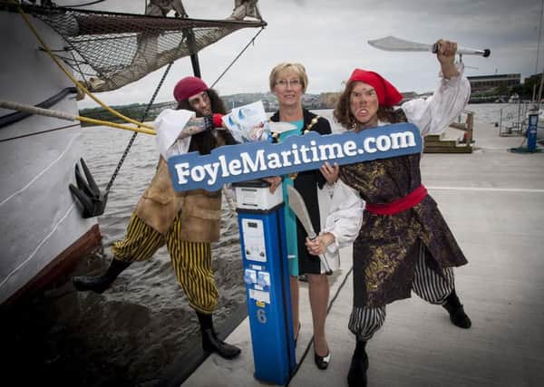 MARITIME PROGRAMME LAUNCH. . . .The Mayor of Derry City and Strabane District Council, Councillor Hilary McClintock pictured at the launch of the 2016 Foyle Maritime Programme at the 'Flying Dutchman' ship docked at Foyleside on Friday afternoon, accompanied by pirates Luke Blakeley and Damon Cooper from 'In Your Space Circus'. This year's Festival runs from July 9-17. (Photo: Jim McCafferty Photography)