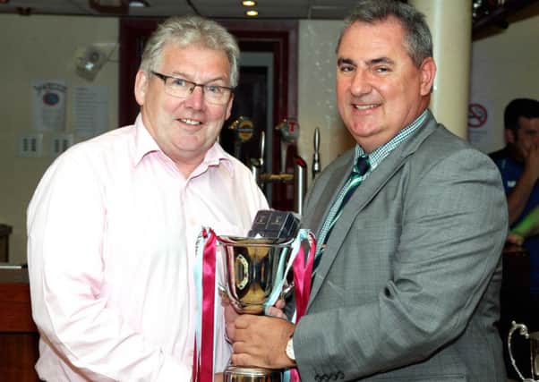 St Mary's will kick off the Intermediate season this weekend aiming to follow the trophy success enjoyed by the club's reserves last season. The Saints finished the season as Mid-Ulster Reserve League Division One champions. Enjoying the presentation ceremony are Tom Mallon (left, St Mary's) and Sean O'Neill (league chairman). Pic by RicPics.