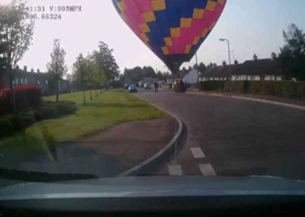 Maghera residents awakened to an unexpected visitor as a Gilford man's hot air balloon dropped by.