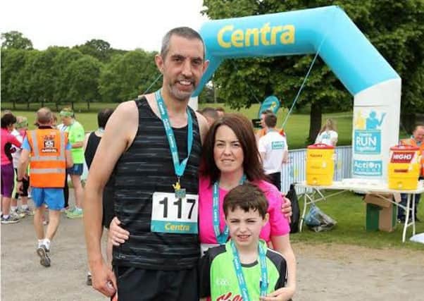 Garry, Orry George and Amanda McGuickin from Cookstown took part in the first ever Centra 5k pairs run for Action Cancer at Ormeau Park