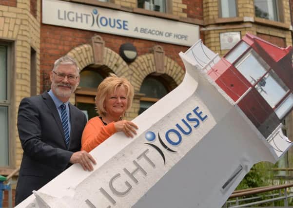 Mark Stewart, Centre Manager Abbeycentre and Jo Murphy, Coordinator at Lighthouse. INNT 25-801CON