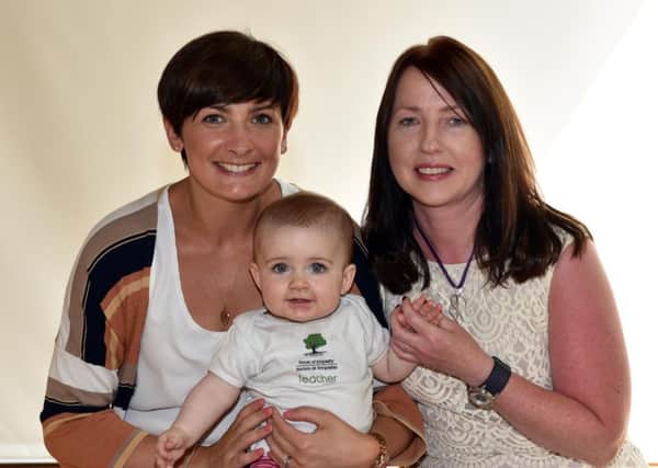 Cathy Hopkins and baby Maisie who took part in the Roots of Empathy Programme with Norma Johnston from Moyle Primary School, Larne.  INLT 25-655-CON