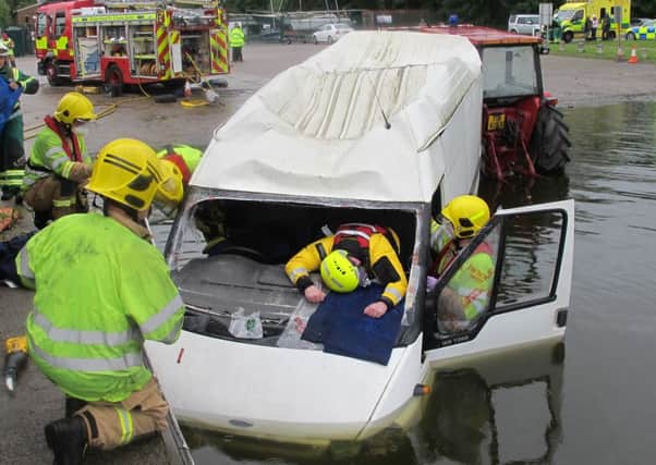 Emergency services in rescue simulaton at Kinnego Marina