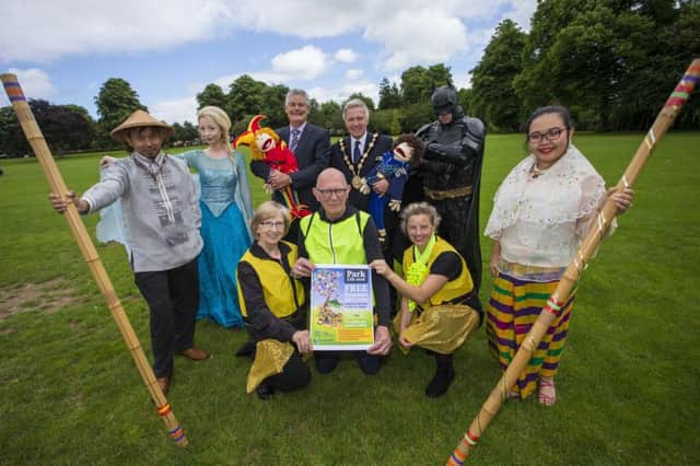 Pictured with Councillor Tim Morrow, Chairman of the Council's Leisure & Development Committee and the Mayor, Councillor Brian Bloomfield at the launch of the Park Life summer programme of events are: members of Distance Dancing, the local Indonesian community, Mr Hullaballoo character, Princess Elsa and Batman.