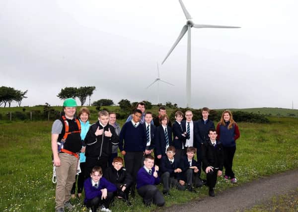 Pupils from Cedar Lodge School pictured on their visit to Carn Hill Wind Farm with Una Orr (Key Stage Leader) and Nick Cullen, Gaelectrics Operations and Maintenance Manager. INNT 25-803CON