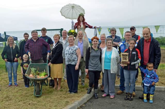 The Mayor of Mid and East Antrim Borough, Councillor Audrey Wales MBE, officially re-opened Greenisland Allotment Gardens on Saturday during a community fun day. INCT 25-701-CON