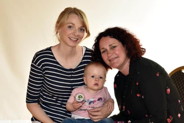 Amy Donaghy and baby Saoirse who took part in the Roots of Empathy Programme with Tracy White from Balnamore Primary School, Ballymoney. inbm26-16s
