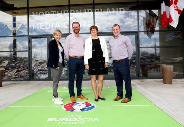 Pictured are Oonagh O'Reilly, Irish Football Association Director Of Sales And Marketing, Economy Minister Simon Hamilton, Mayor of Saint Georges de Reneins Sylvie Epina and Patrick Nelson, chief executive of the Irish Football Association. William Cherry/ Press Eye