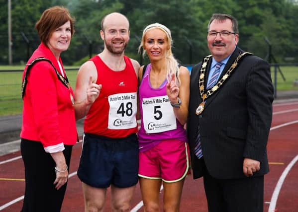 Mayor of Antrim and Newtownabbey, Councillor John Scott and Deputy Mayor, Councillor Noreen McClelland with male and female winners, Mark McKinstry and Amy Bulman.