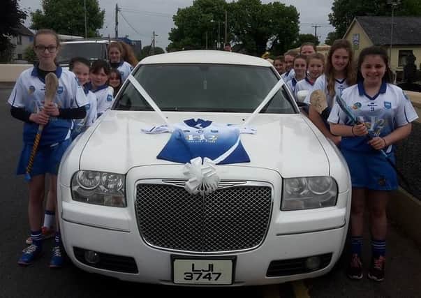 Cailini an Chnoic camogie players adorned the wedding car with the Number 13 jersey, formerly worn by their coach Fionnuala Hagan