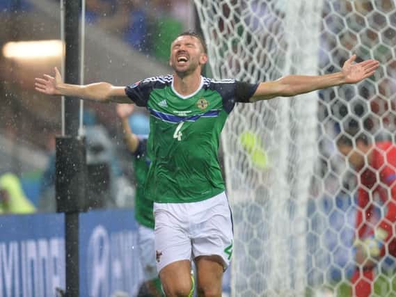 Pacemaker Press 16/6/2016 Northern Ireland v Ukraine Euro 2016 Group CNorthern Ireland's Gareth McAuley opens the scoring in the 48th minute during this afternoons Euro 2016 International  at the The Parc Olympique Lyonnais on Thursday in Lyon.Pic Colm Lenaghan/Pacemaker