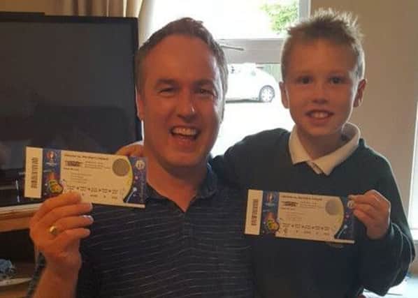 Richard and Zak McGall with their Euro 2016 tickets.