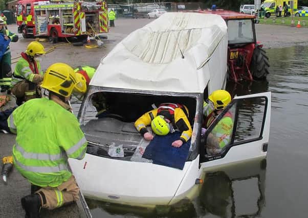 Northern Ireland Fire & Rescue Service Firefighters deal with a simulated road traffic collision and subsequent water rescue at Kinnego Marina on Sunday 19th June. Other partner agencies involved in the exercise included Police Service of Northern Ireland (PSNI), Northern Ireland Ambulance Service (NIAS), Lough Neagh Rescue and Sky Watch Civil Air Patrol.