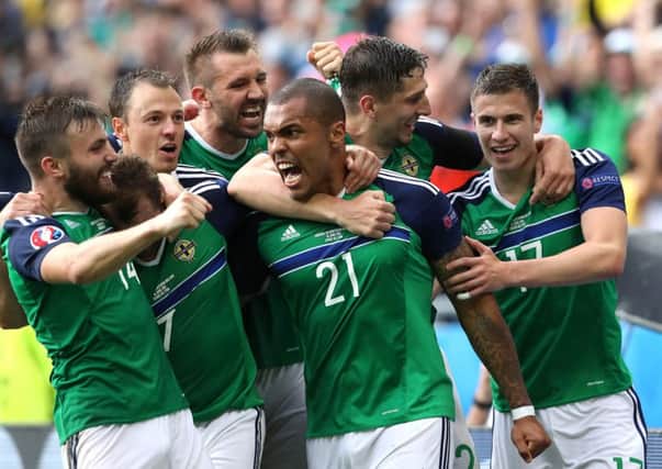 Northern Ireland players celebrate their 2-0 win over Ukraine