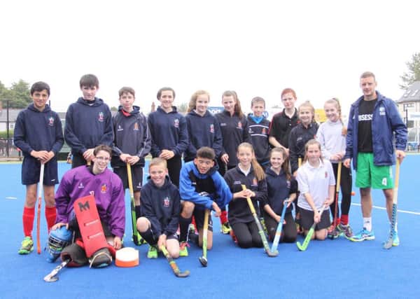 Irish hockey player Jonny Bell with Wallace hockey players at last weeks #obsessed coaching session involving five current Irish players.