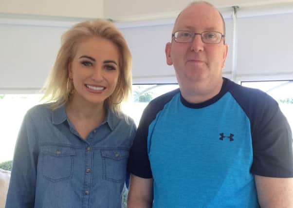 Country music star, Cliona Hagan, with Robbie Ryan, her neighbour in Ballinderry.