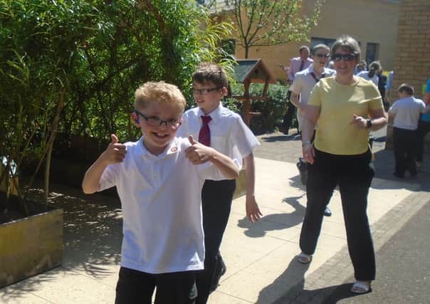 Pupils enjoying the daily mile initiative at Jordanstown School. INNT 26-806CON