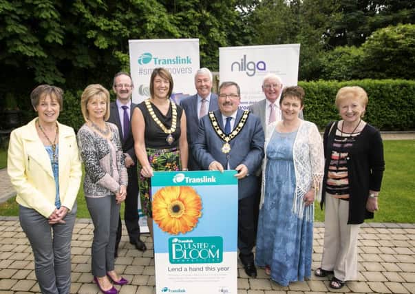 Eileen Warwick and Helen Boyd, Tidy Randalstown, Ivor McMullan, Antrim and Newtownabbey Borough Council, Ald Freda Donnelly, Interim President, NI Local Government Association, Frank Moore, Translink Chairman, Cllr John Scott, Mayor of Antrim and Newtownabbey Borough Council, Richard Wallace, Ballynure in Bloom, Una Johnston, T.I.D.A.L. and Isobel Wallace Ballynure in Bloom. INNT 26-801CON
