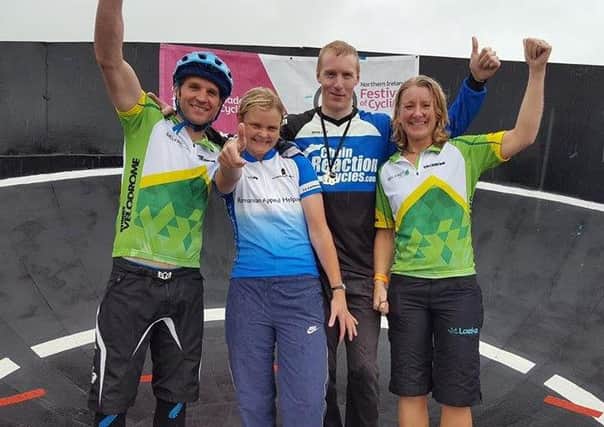 The Belfast Titans (green tops) congratulate Nick Ryles and Caroline Patterson on winning the amateur Round 4 of the StreetVelodrome Series. INNT 26-800CON