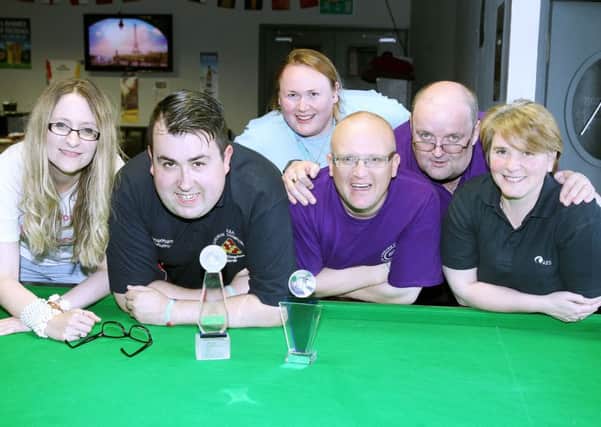 At the Carrickfergus Junior Gateway Club Pool Competition are Aine O'Hare, Community Support officer, Mencap, Jonathan McAuley, Carrickfergus Senior Gateway Club member, Julie Stirling, club leader in charge, Jackie McBride,  Lisburn Senior Gateway member, Stephen Lenaghan, club leader in charge of Lisburn Senior Gateway and Denise Savage, AES UK & Ireland (Carrick Junior Gateway is its charity of the year 2016). INCT 26-707-CON
