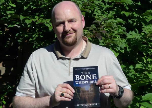 Whitehead author David Allen with his new book The Bone Whisperer. INLT-26-704-con