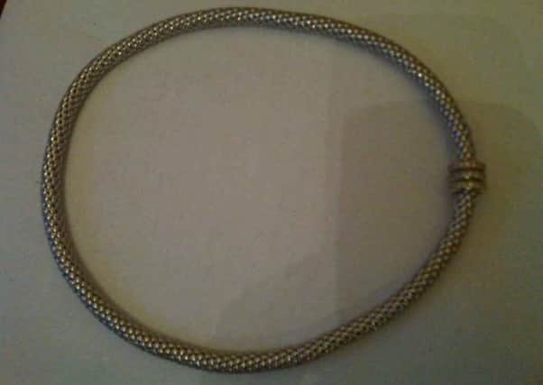 Necklace stolen from a car in Draperstown