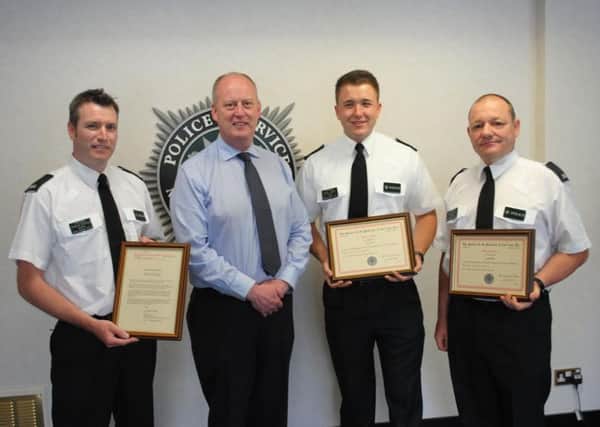 Chief Constable recognises bravery of three police officers who saved a man from a house fire in Castledawson