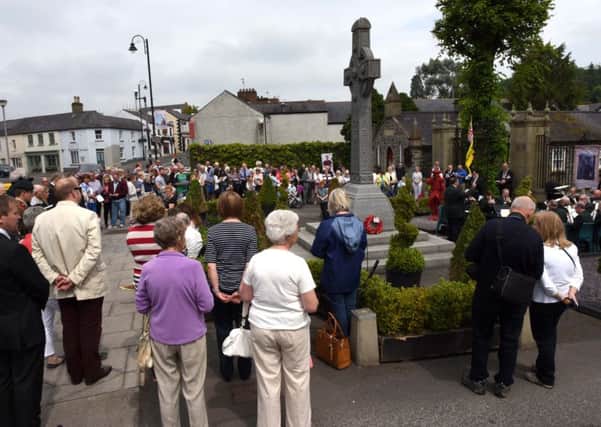 Crowds gather by the War Memorial in Hillsborough for a service organised by Hillsborough Old Guard in tribute to 10 villagers who died when they were hit by an artillery shell as they were moving out of the French village of Martinsart to take up forward positions on the Somme on June 28 1916.