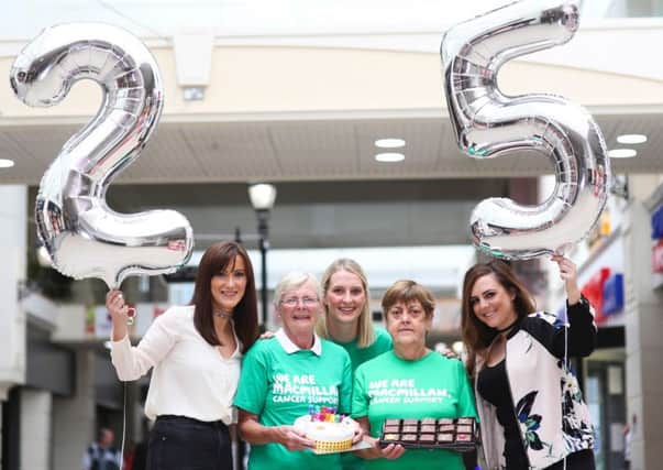 Macmillan fundraisers throw an impromptu birthday party for Fairhill Shopping Centre to celebrate becoming their new charity party and the centres 25th birthday.Natalie Jackson from Fairhill, Susan McMillan, Margaret Jameison from Macmillan and Danielle McCaughern from Fairhill.