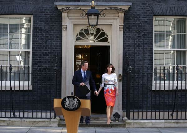 Prime Minister David Cameron outside 10 Downing Street, London, with wife Samantha where he announced his resignation after Britain voted to leave the European Union in an historic referendum which has thrown Westminster politics into disarray and sent the pound tumbling on the world markets. PRESS ASSOCIATION Photo. Picture date: Friday June 24, 2016. See PA story POLITICS EU. Photo credit should read: Daniel Leal-Olivas/PA Wire
