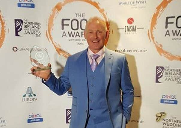 Dromore's Krazi Baker, Mark Douglas, with his street food award at the Food Awards Northern Ireland.