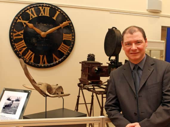 NO EXCEPTION. Ballymoney Museum Manager, Keith Beattie, pictured during an 'Artefacts of Exception' exhibition.INBM7-15 007SC.
