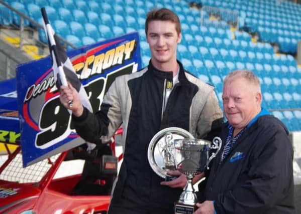 F2 final winner Dean McCrory receives the Norman Cromie Memorial Trophy from Earl Cromie. Pictures: David Park.