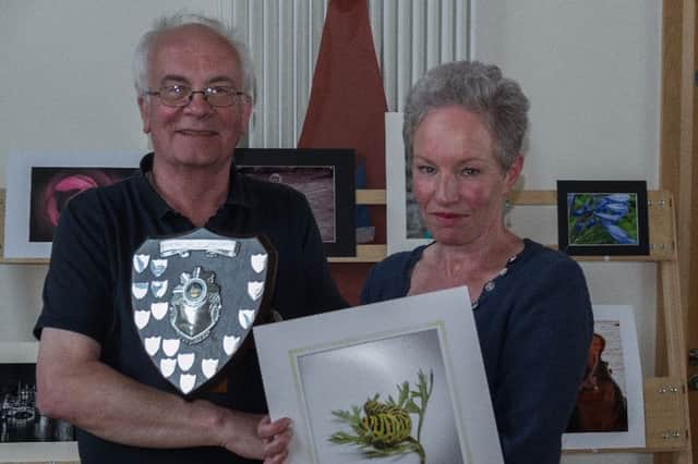 Kathy Stewart receiving her Print of the Year award from   FPC Club Chairman. inbm27-16s