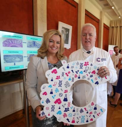 Jo-Anne Dobson MLA supporting a new vision for fighting Cancer in Northern Ireland with leading Cancer Specialist from the Centre for Cancer Research and Cell Biology at Queens University Belfast, Professor Mark Lawler.