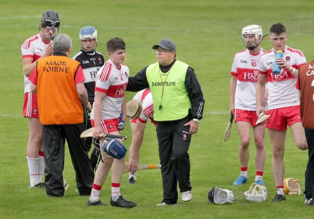 Derry manager John A. Mullan with his players as the match goes into extra time against Antrim during the Ulster Minor Hurling Championship semi-final played on Sunday at Owenbeg. Picture Margaret McLaughlin 26-6-16