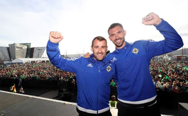 Niall McGinn and Gareth McAuley pictured at the Homecoming event for the Northern Ireland football team at the Fan Zone in Titanic Quarter. 
Picture by William Cherry/Press Eye