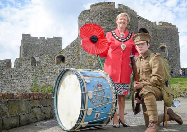 Mayor of Mid and East Antrim Borough Council, Councillor Audrey Wales MBE, is joined by a WW1 soldier to commemorate the centenary of the Battle of the Somme.Pic by Simon Graham/Harrison Photography