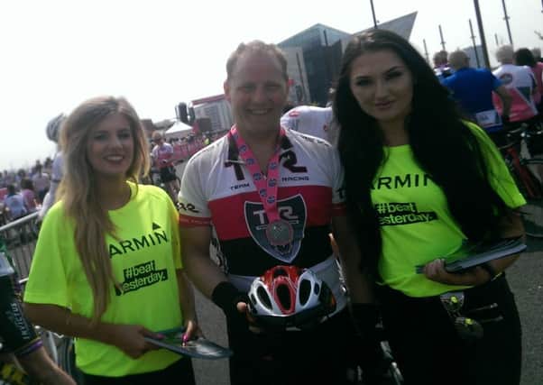 Mark Williamson takes time to get to know the sponsors Garmin at the Gran Fondo.