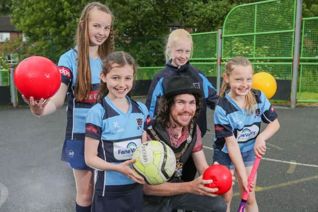 Some of the young people from local Armagh Ladies Hockey Club joined Lord Mayor of Armagh City, Banbridge and Craigavon, Councillor Garath Keating to launch this summers MUGA Sports Programme. The successfully programme has been expanded across the Borough to include venues in Armagh, Banbridge and some rural areas.