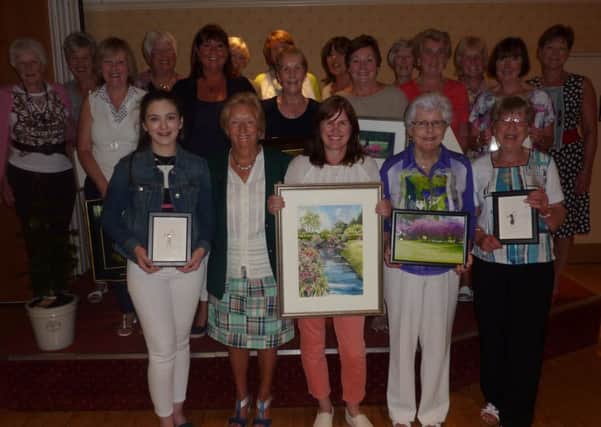 All of the prize-winners for the June in the Lisburn GC ladies' section collected their awards.