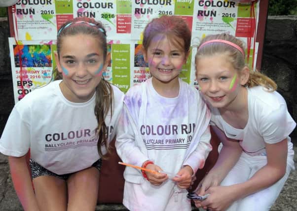 Kaytlin, Darcy and Olivia getting ready for the Ballyclare PS Colour Run at Sixmile Park on Saturday, June 25. INNT 26-208-AM
