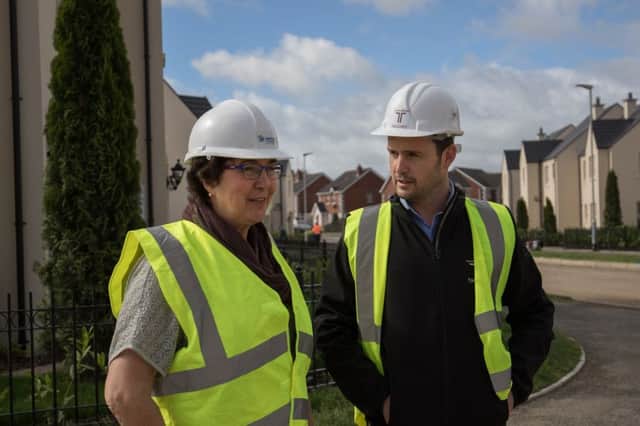 Jenny Williams, Chief Executive of Habitat for Humanity Northern Ireland and, Ryan Byrne, Marketing Director at Taggart Homes, discuss their new partnership. INUS Taggart-Habitat