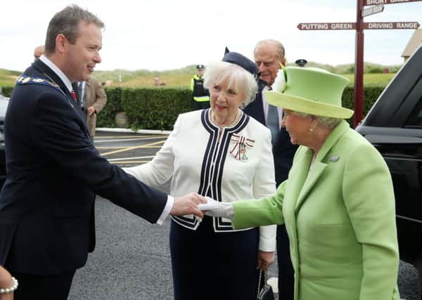 Press Eye - Belfast - Northern Ireland - 28th June 2016 

The Queen and The Duke of Edinburgh pictured at a Reception & Civic Lunch at Royal Portrush Golf Club, County Antrim

She is pictured with Her Majesty's Lord-Lieutenant for the County of Antrim Joan Christie meeting Deputy Mayor James McCorkell.

Photo by Kelvin Boyes / Press Eye