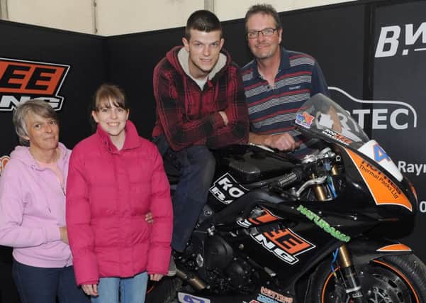 Lisburn rider Tim Elwood with his parents Thomas and Sadie and his sister Victoria at the Ulster Grand Prix Night of Nostalgia last August.