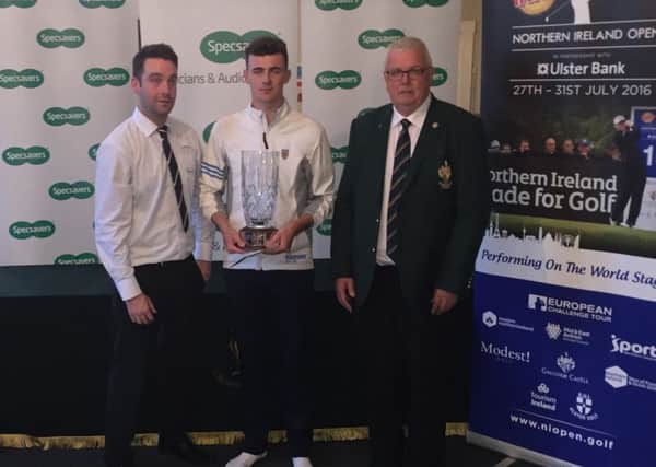 Andrew Lowry (Specsavers Ballymena) presents Jamie Fletcher (Warrenpoint GC) with the North of Ireland Amateur Open Strokeplay trophy alongside Galgorm Castle Golf Club Captain Ian Henry.