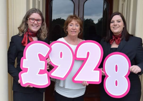 Deirdre Conlon (centre), care services manager at Cancer Focus NI, receives Â£928 from Naomi Taylor (left) and Louise Nicholl from Galgorm Resort and Spa in Ballymena. The money was raised at Pink Pamper events at the spa and goes towards the charitys care services for local breast cancer patients. The Spa also has 15 therapists specially trained in working with cancer patients.
